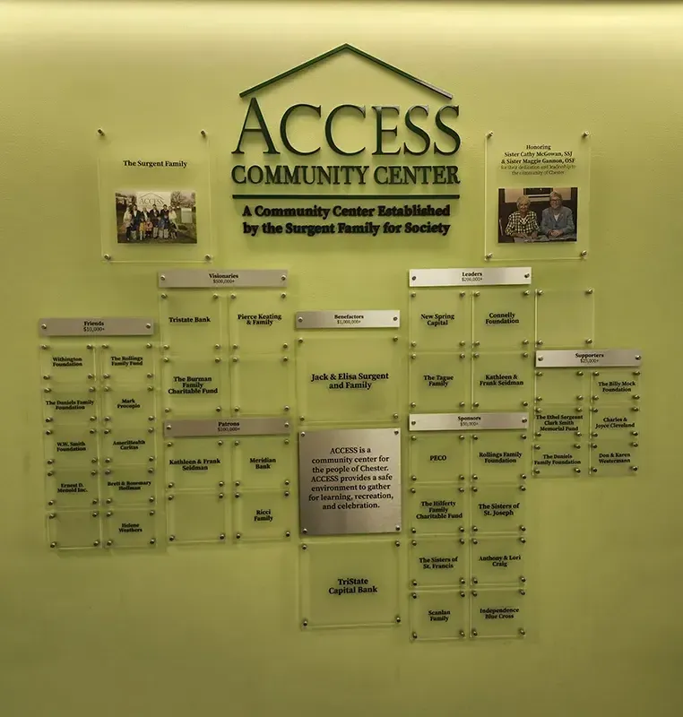 A B&D layered donor recognition wall for the ACCESS community center, with tiered giving levels and engraved donor name plates.