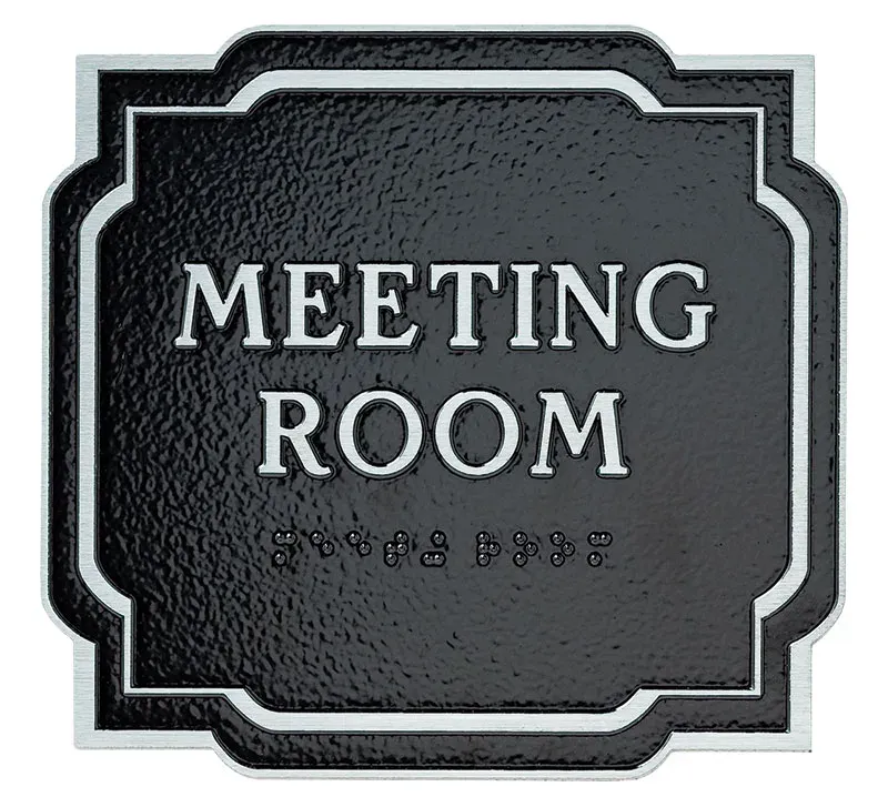 A B&D ADA-compliant meeting room sign with raised text and Braille.