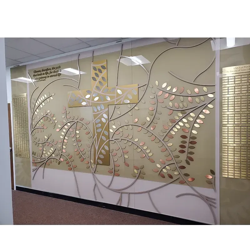 Custom church donor wall with engraved donor name plates arranged beneath a decorative header, installed in a church entryway.