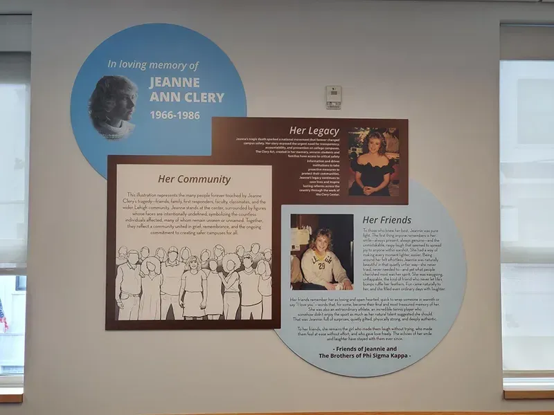 A B&D memorial display wall for the Clery family, combining engraved plates with a dimensional feature graphic.