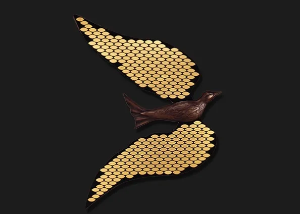 Dove of Hope donor display shaped as a dove in flight, its wings formed from rows of engraved gold donor name plates.