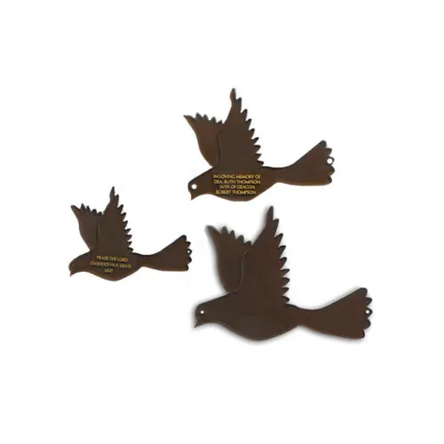 A B&D dove-shaped recognition plaque with engraved donor text.
