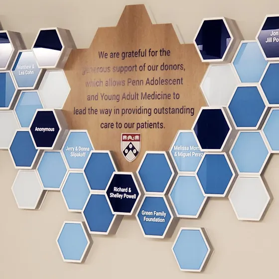 B&D donor recognition wall at Penn Medicine's Radnor Campus, with rows of engraved donor name plates.